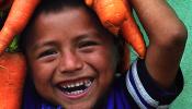 Guatemala Child with Carrots 