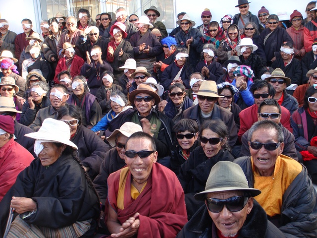 A sea of happy faces of Tibetans who have had their sight restored at a Seva eye camp