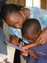 child-being-tested-for-glasses-in-tanzania1