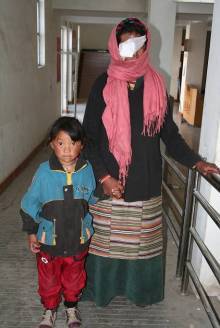 Chime and her daughter Tashi after one eye surgery Seva Tibet