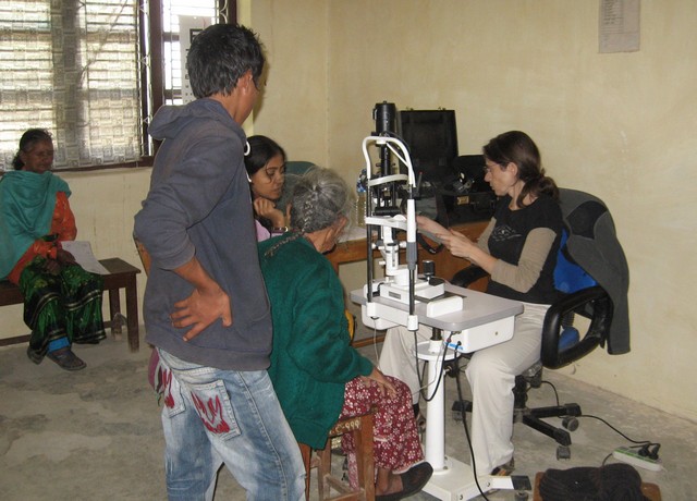 The blind woman has her eyes examined by Dr. Iris Winter from Biratnagar Eye Hospital. During the first day of the camp, Dr. Winter examined 220 patients.