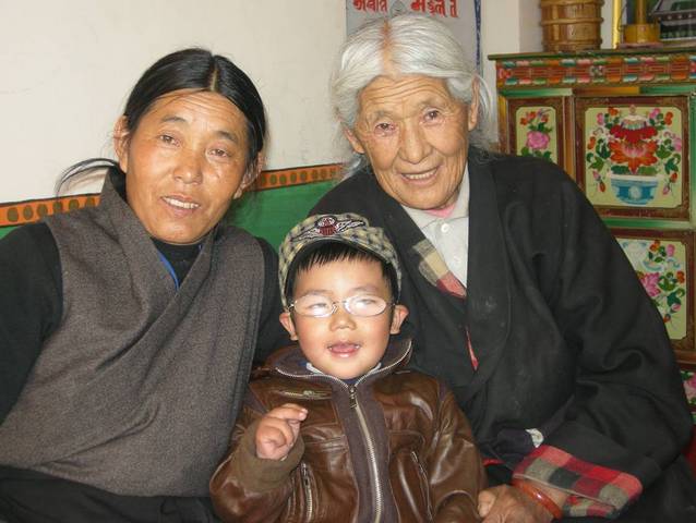 Tsultrim Dorje with aunt and grandmother
