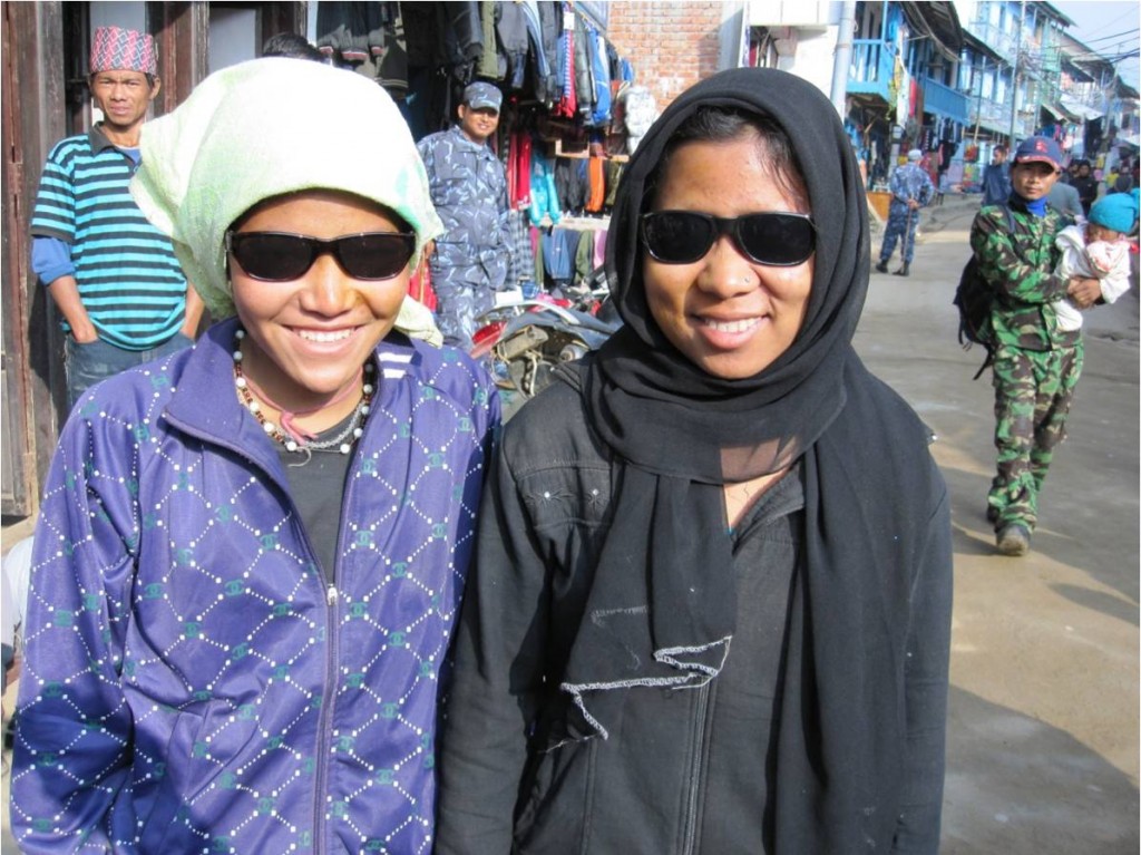 Two Nepali girls who had their sight restored at an eye camp by Seva