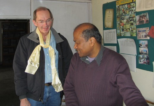 Adrian Gordon being greeted by Shravan at the Seva Nepal office