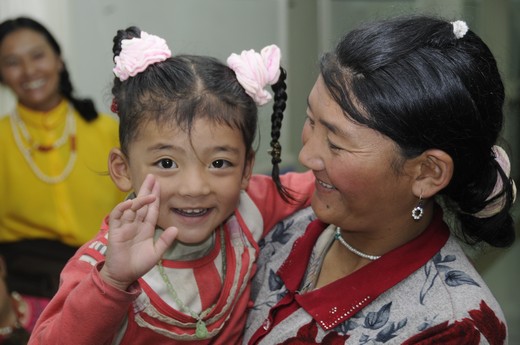 child after cataract surgery in Tibet