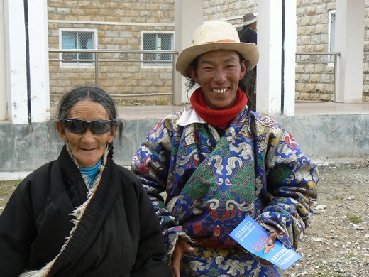 Mother and son after eye surgery by Seva in Tibet